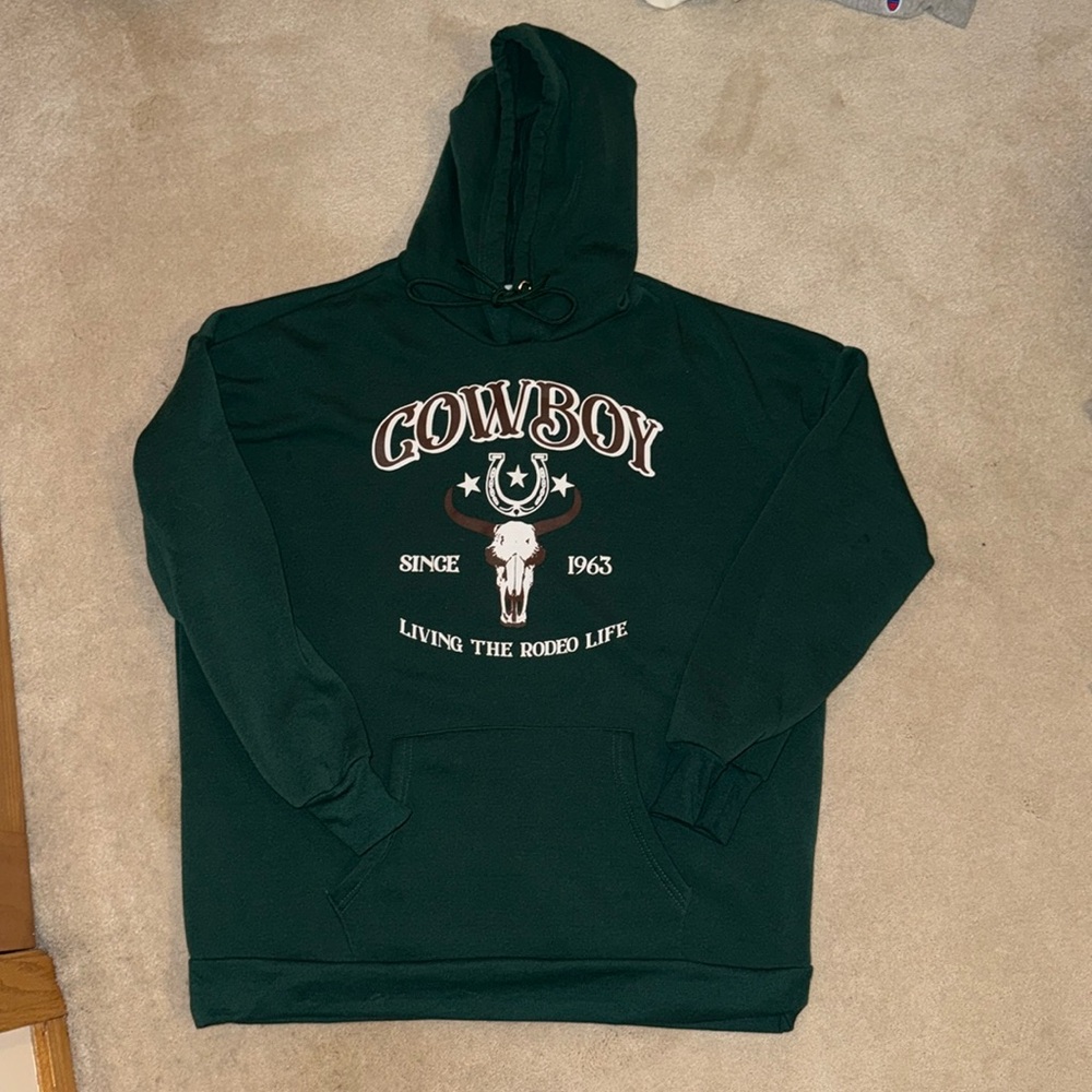 XL army green “cowboys since 1963 living the rodeo life” hoodie